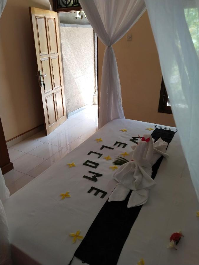 Asih Homestay Pemuteran Esterno foto