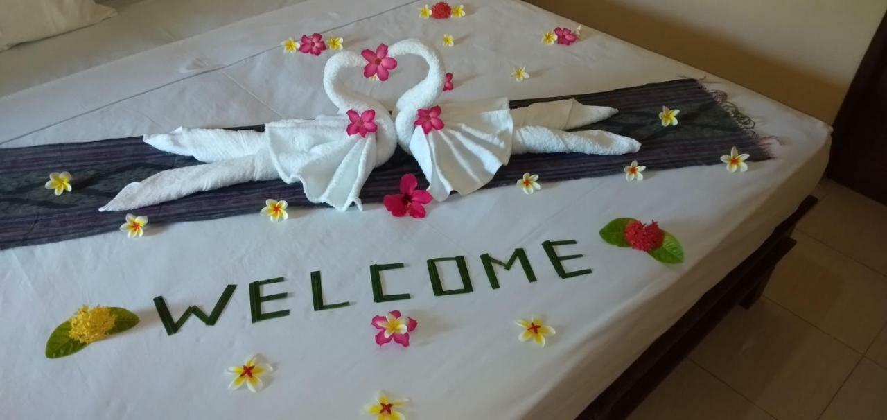 Asih Homestay Pemuteran Esterno foto